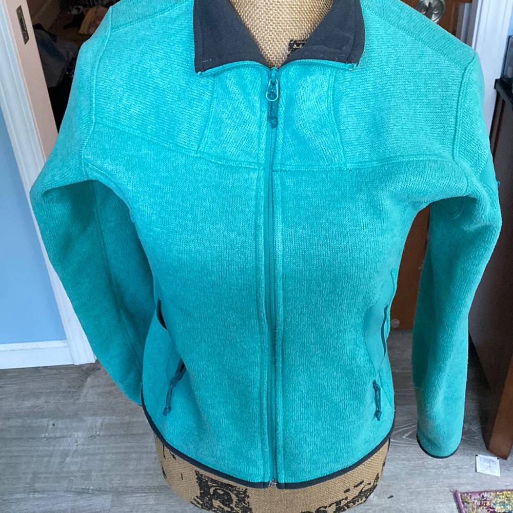 Small petite Arcteryx front full zip jacket. Light wear as seen in the pictures